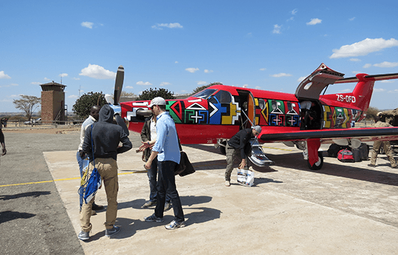 People boarding a charter aircraft